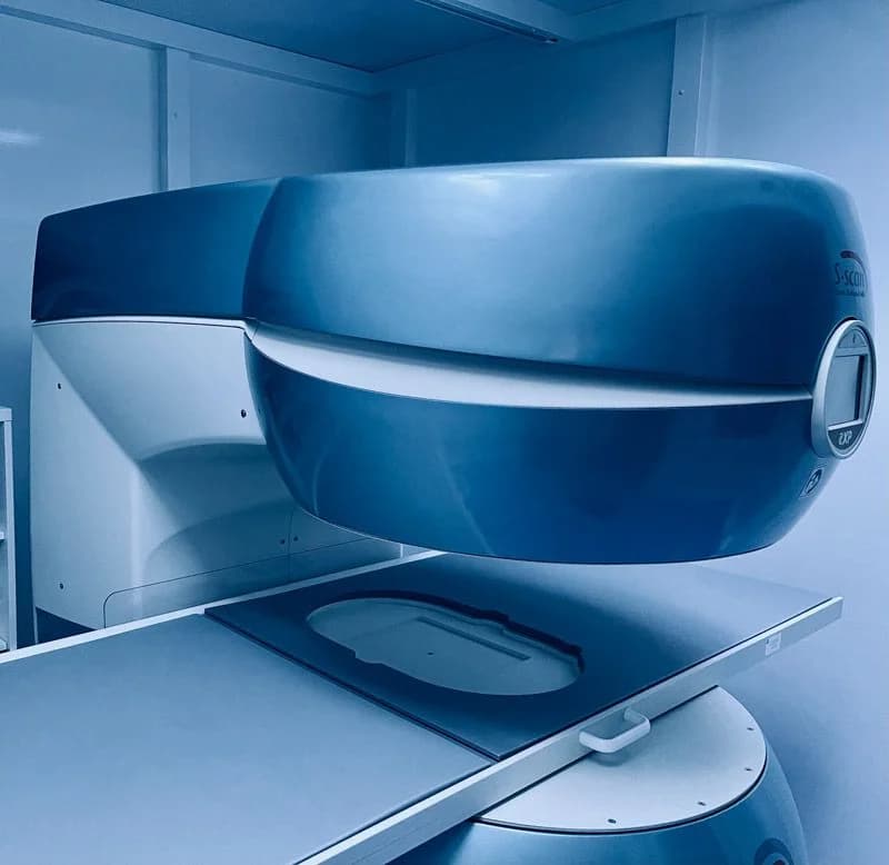 An open MRI scanner in a clinical imaging room